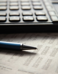 Office still-life, calculator and document.