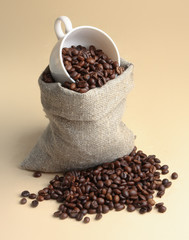 Cup from coffee on coffee grains.