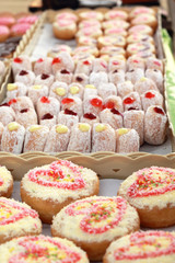 A lot of donut and strawberry jam