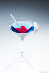 Cocktail with vodka and strawberry sphere