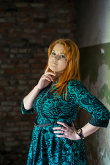 Obraz premium Young girl with red hair