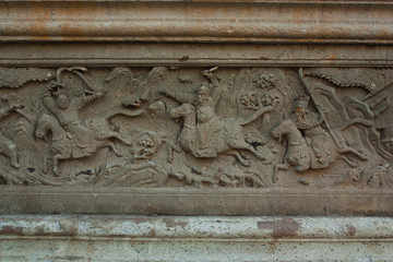 Rock Carvings on temple wall Thailand.