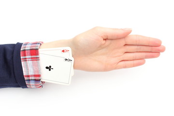 Business woman pulls an aces from his sleeve. White background