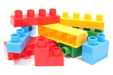 Colorful building blocks for children on white background