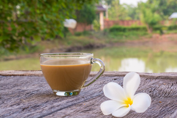 Morning cup of coffee waterfront