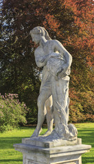 Fototapeta premium Statue depicting an allegory of water, Royal Łazienki Garde