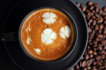 art coffee in black cup