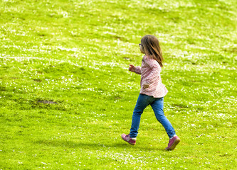 Fototapeta na wymiar Little Girl Running