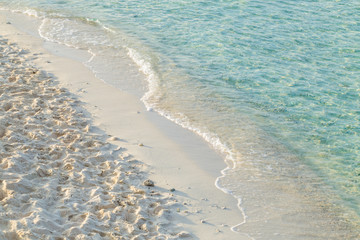 Soft wave of the sea on the sandy beach