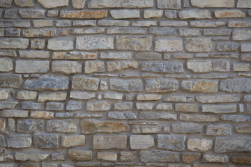 paved gray wall