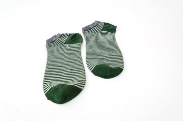 green striped socks isolated on white