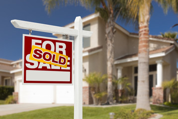 Sold Home For Sale Sign in Front of New House