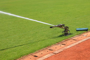 splash water to football field