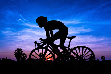 Naklejka premium Cycling triathlon on twilight time