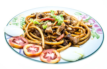 Pasta with tomato sauce and crispy pork