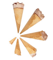 ice cream cone with chocolate and hazelnut isolated on white