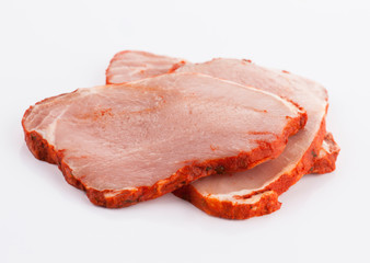 raw marinaded loin steaks on white base