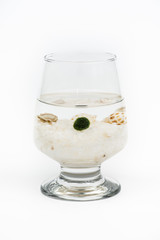 moss ball (marimo) in glass.
