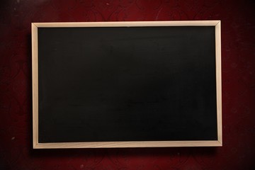 Composite image of chalkboard with wooden frame