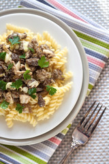 Spiral pasta with morel mushrooms