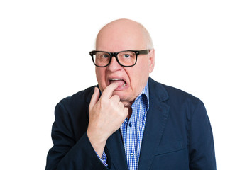 old man showing disgust, sticking finger in mouth