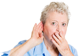 Juicy rumors, curious senior woman listening to gossip