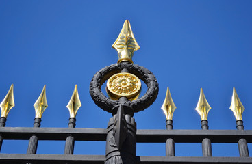 Steel fence with gold spears