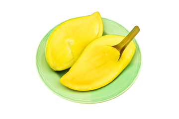 Fototapeta na wymiar Eating slice half ripe mango isolated