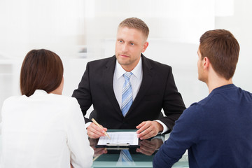 Couple Consulting Financial Advisor