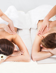 Obraz na płótnie Canvas Couple Receiving Back Massage