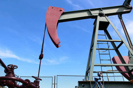 crude oil  jack pump under blue sky in europe