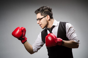 Funny boxer businessman in sport concept