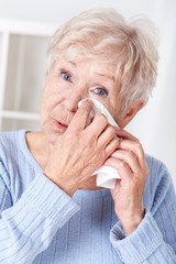 Elderly woman crying