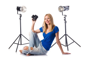 Woman with camera isolated on the white