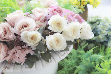 vintage pastel color style of white roeses flowers bouquet arran
