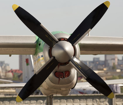Front view aircraft turboprop engine with propeller, close-up