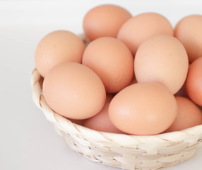 Brown eggs in a basket