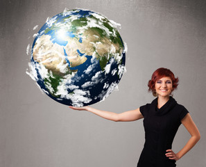 Pretty girl holding 3d planet earth