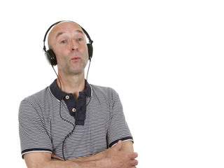 Man with headphones whistling along to music