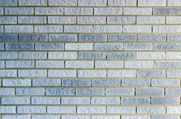 Background texture of a grey brick wall