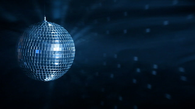 Disco ball over dark background