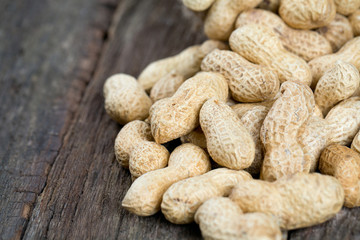 peanuts on an old wooden surface