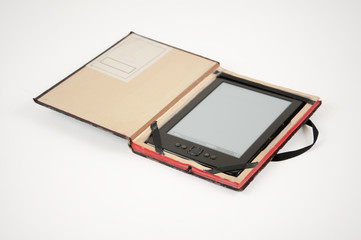 E-book reader in a case made of an old book