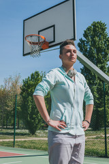 Short hair girl in a basketball playground