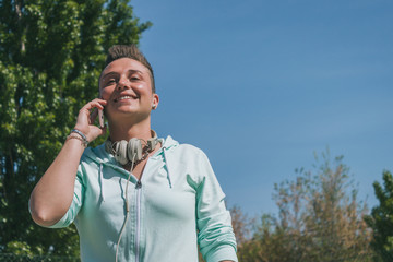 Short hair girl talking on phone