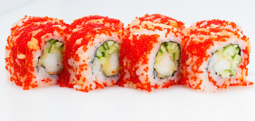Sushi roll with red tobiko. Macro.