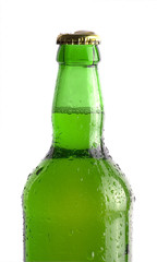 Bottle of beer with drops isolated