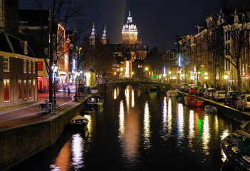Fototapeta na wymiar Evening view on the St. Nicolas Church in Amsterdam