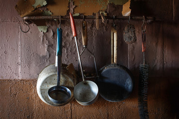 Vintage kitchen instruments hanging on wall