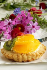 piece of cake with strawberry on a fork